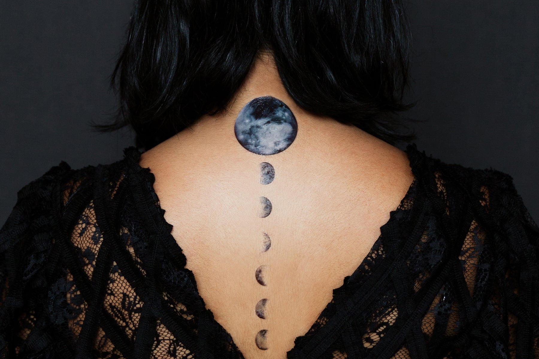 Moon phases tattoo down a spine by Ben Licata: TattooNOW